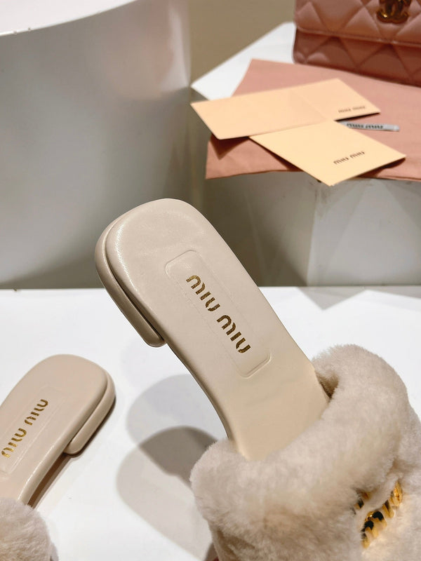 Mules Miu Miu en cuir beige clair et fourrure 739562