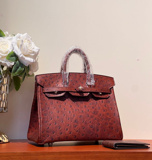 KELLY SELLIER 25 BAG IN BERRY RED OSTRICH LEATHER WITH GOLD HARDWARE (MADE - TO - ODER)