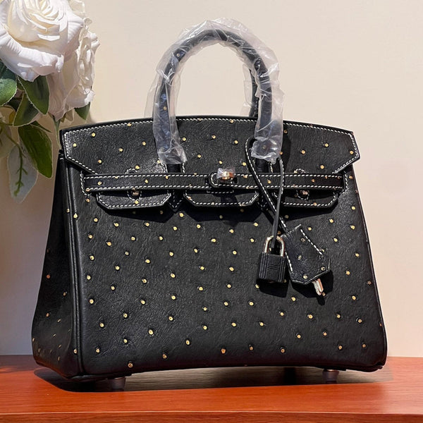 BORSA KELLY SELLIER 25 IN PELLE DI STRUZZO NERA CON STRASS ORO (FATTA SU ORDINAZIONE)