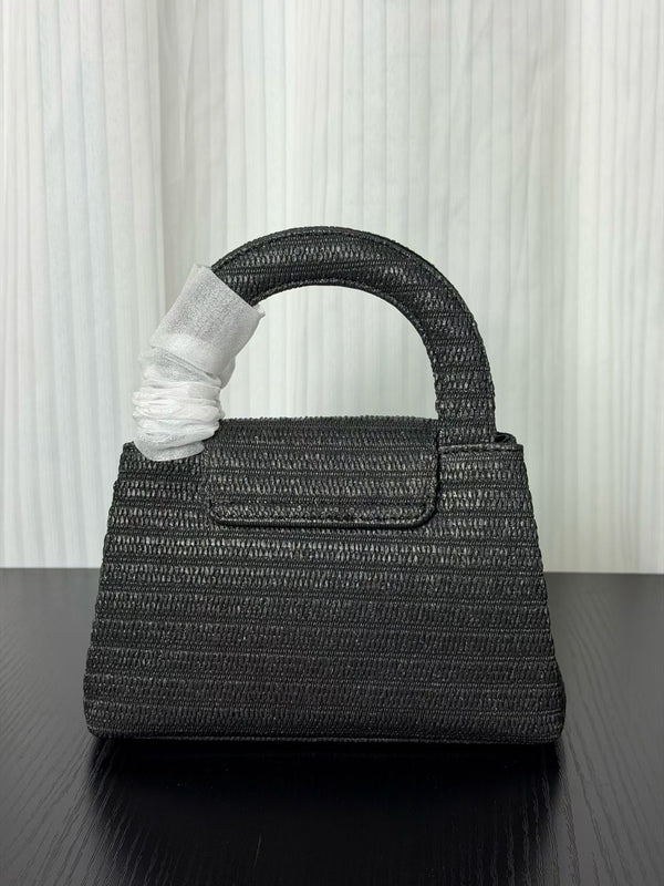 Sac Chanel Kelly 2026 19 cm en raphia et cuir noir