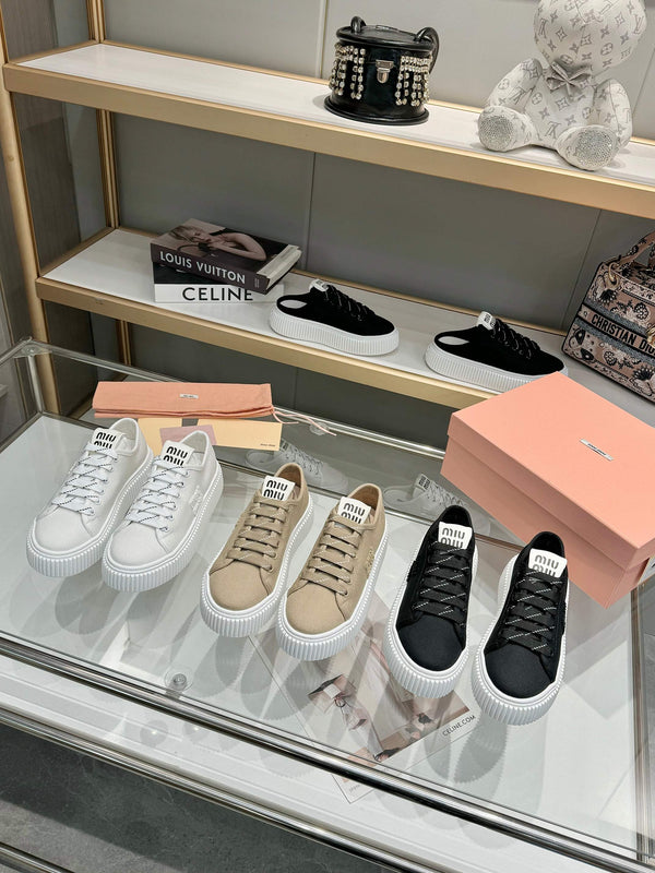 Miu logo-patch sneakers 45mm Black Canvas 456831