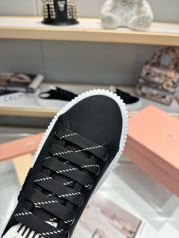 Miu logo-patch sneakers 45mm Black Canvas 456831