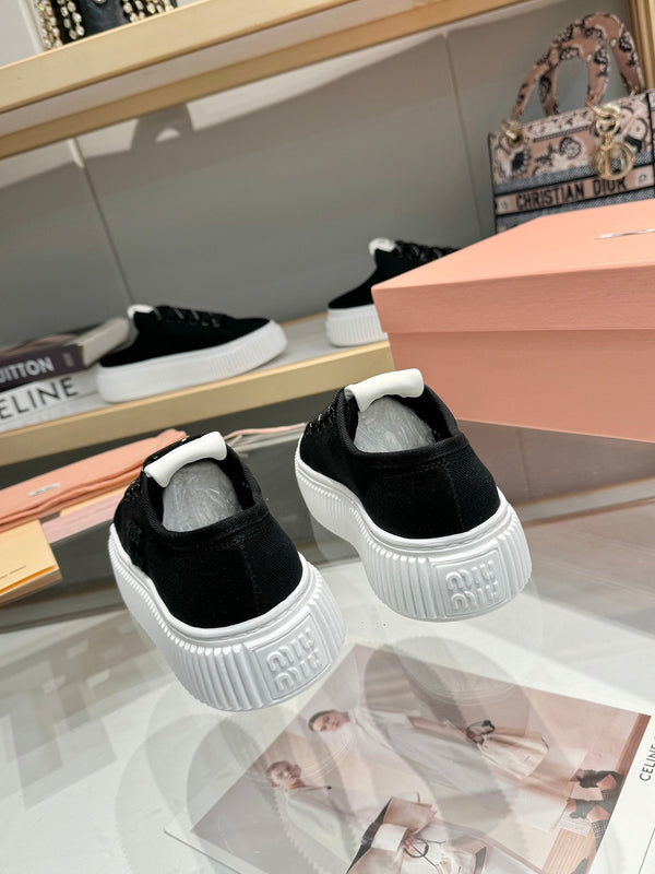 Miu logo-patch sneakers 45mm Black Canvas 456831