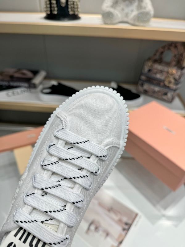 Miu logo-patch sneakers 45mm White Canvas 456833