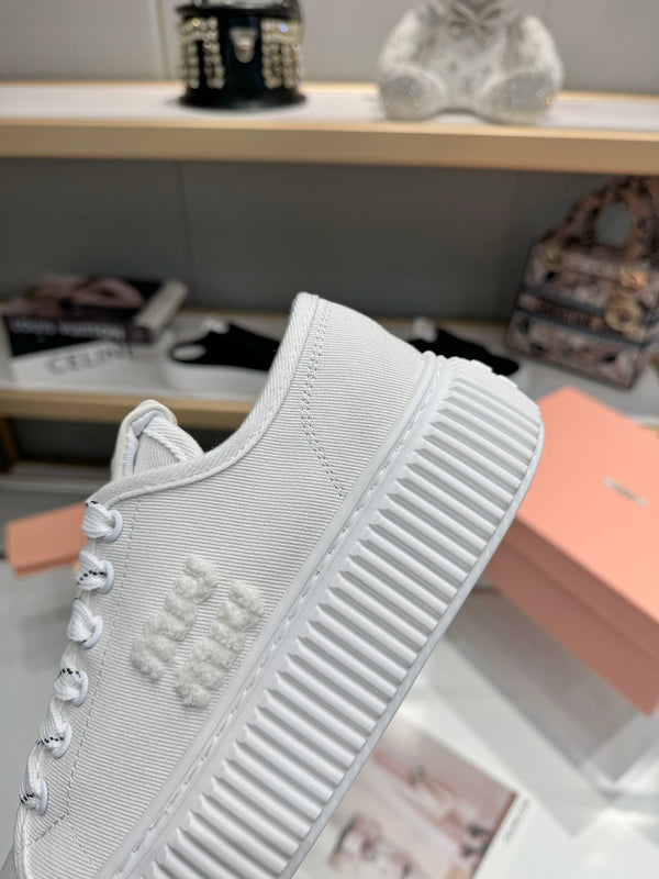 Miu logo-patch sneakers 45mm White Canvas 456833
