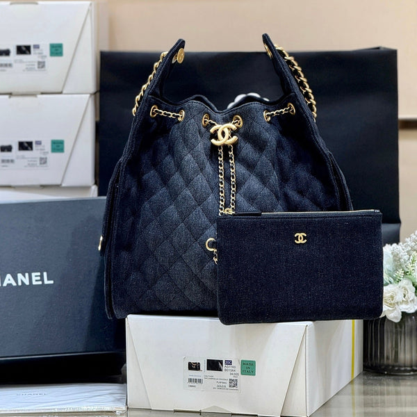 Sac à main CC 25 40 en jean bleu foncé avec détails dorés