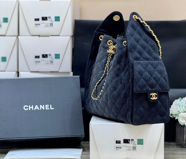Sac à main CC 25 40 en jean bleu foncé avec détails dorés