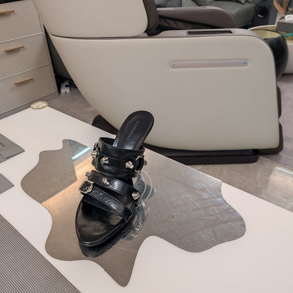 STRAPPY HIGH-HEELED SANDALS IN BLACK STUDDED WAX-OIL SHEEPSKIN