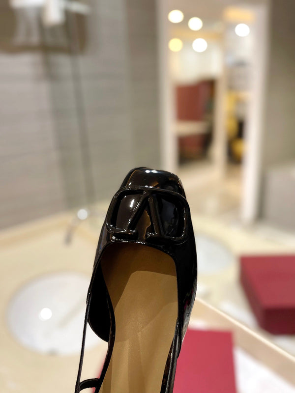 VLOGO BLACK PATENT LEATHER SLINGBACK FLATS