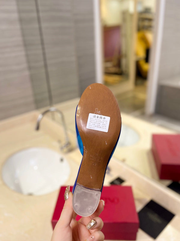 HIGH MULE 60MM IN COBALT BLUE SHEEPSKIN AND TRANSPARENT PVC