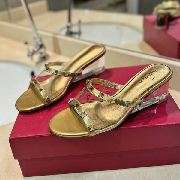 SANDALI ROCKSTUD MULE IN VITELLO ORO E FILM IN PVC TRASPARENTE