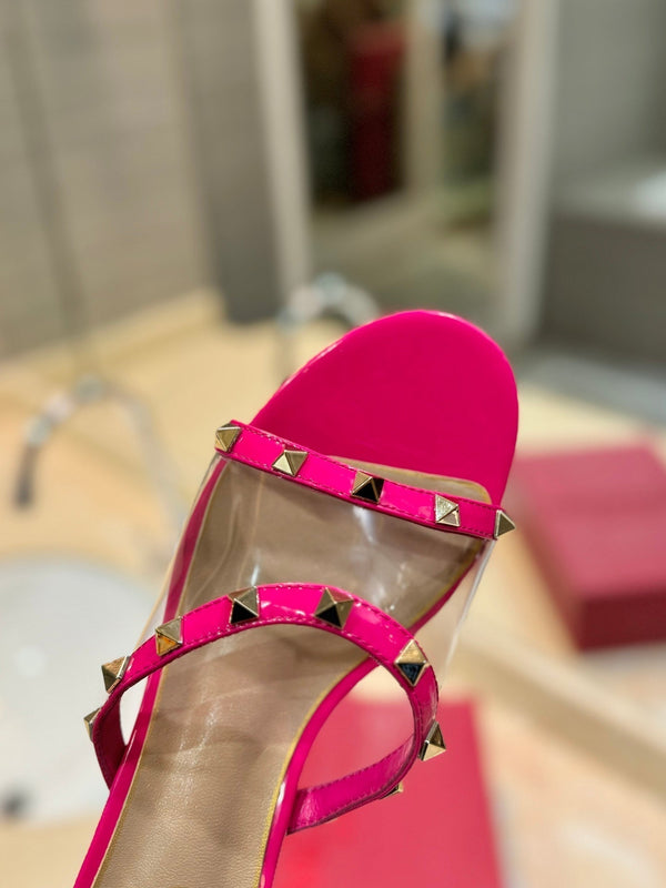 SANDALI ROCKSTUD MULE IN VITELLO ROSA BRILLANTE E FILM IN PVC TRASPARENTE