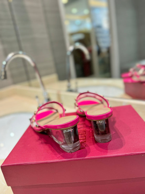 SANDALI ROCKSTUD MULE IN VITELLO ROSA BRILLANTE E FILM IN PVC TRASPARENTE