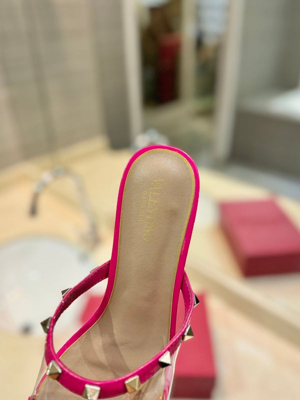 SANDALI ROCKSTUD MULE IN VITELLO ROSA BRILLANTE E FILM IN PVC TRASPARENTE