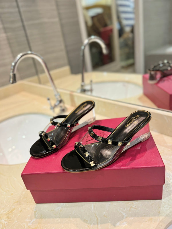 SANDALI ROCKSTUD MULE IN VITELLO NERO E FILM IN PVC TRASPARENTE