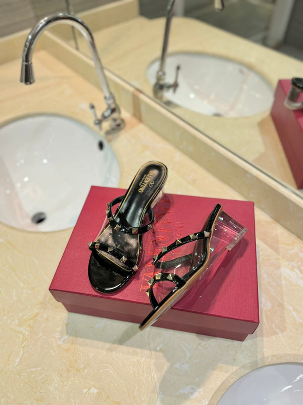 SANDALI ROCKSTUD MULE IN VITELLO NERO E FILM IN PVC TRASPARENTE