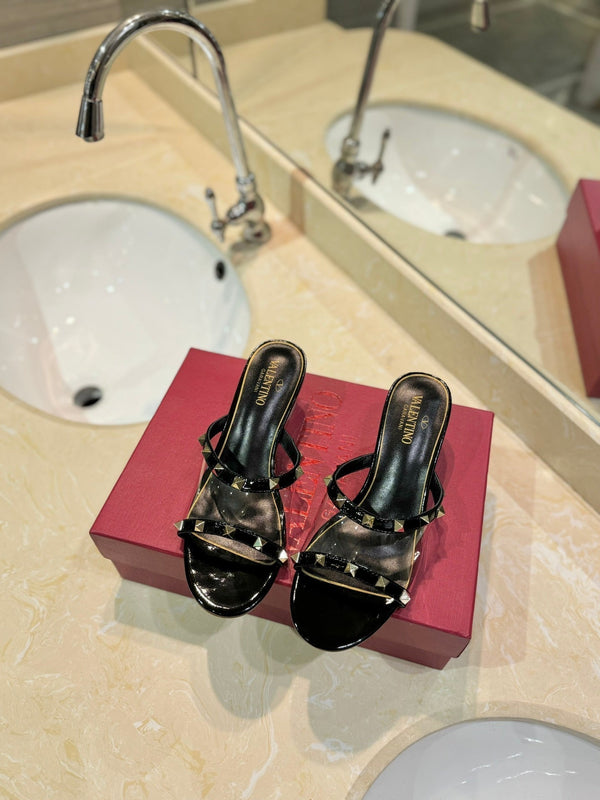 SANDALI ROCKSTUD MULE IN VITELLO NERO E FILM IN PVC TRASPARENTE