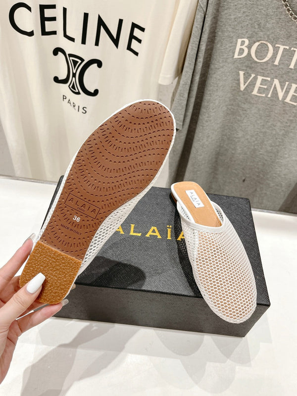 MULES ALAIA FLAT IN RETE BIANCA