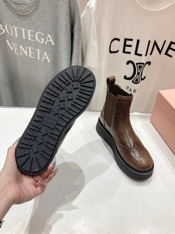 Stivaletti Miu in pelle di vitello lucida marrone caffè