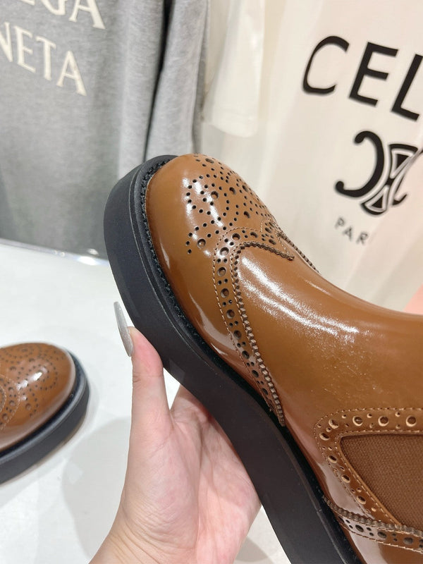 Stivaletti Miu in pelle di vitello lucida color caramello