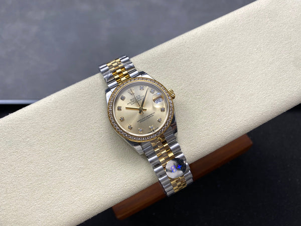 Datejust 31mm Yellow Gold Steel Diamond Bezel Champagne Dial Diamond Numerals