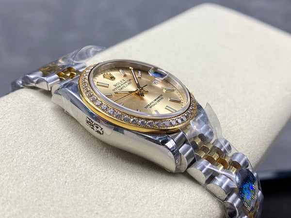 Datejust 31mm Yellow Gold Steel Diamond Bezel Champagne Dial