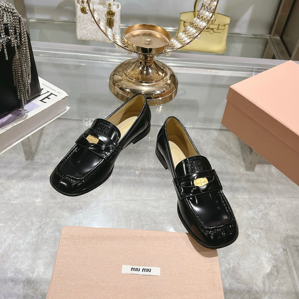 Mocassini Miu 25C in vernice nera 235299