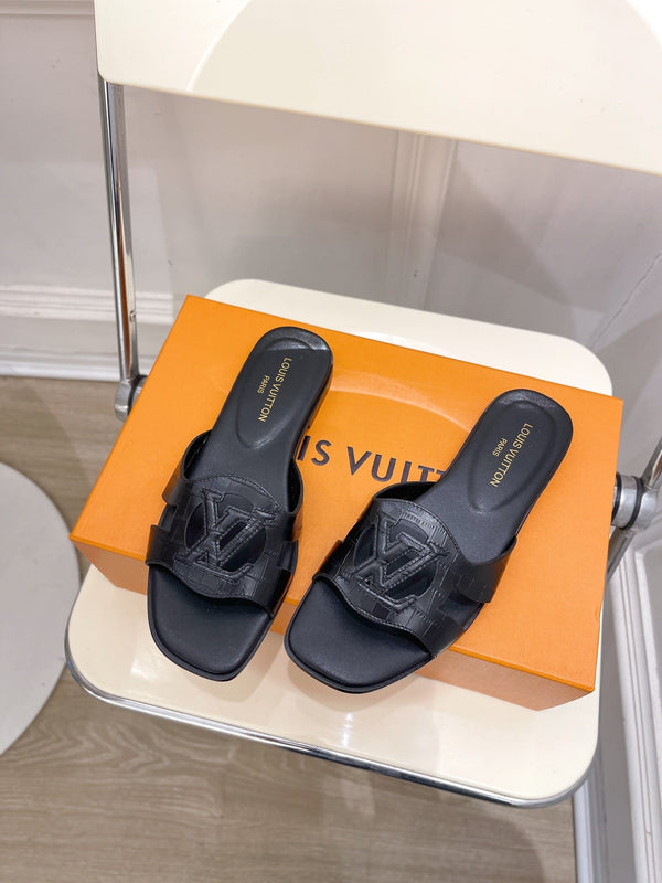 isola flat mule black calfskin