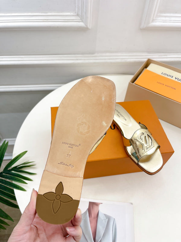 isola flat mule gold metalic calfskin