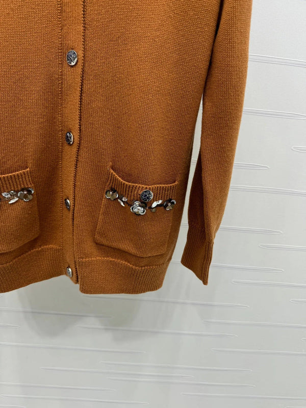 CHANEL HEAVY KNIT CARDIGAN WITH EMBELLISHED FLORAL DETAILS 274877