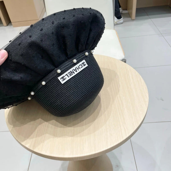 WIDE BRIM HAT IN BLACK STRAW 673034