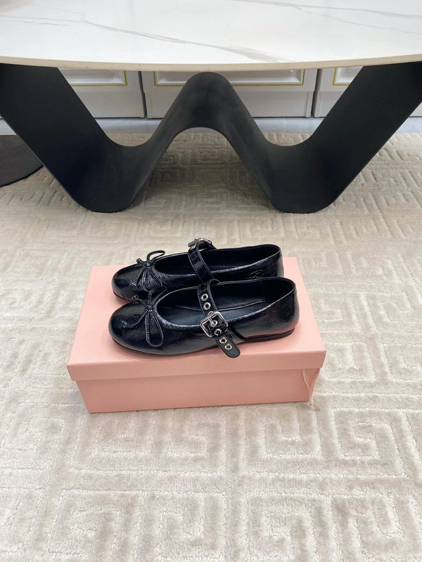 BOW MARY JANE FLAT IN BLACK NAPLAK LAMBSKIN