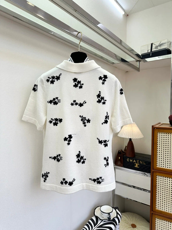 Polo Chanel 2026 en coton noir et blanc à imprimé floral