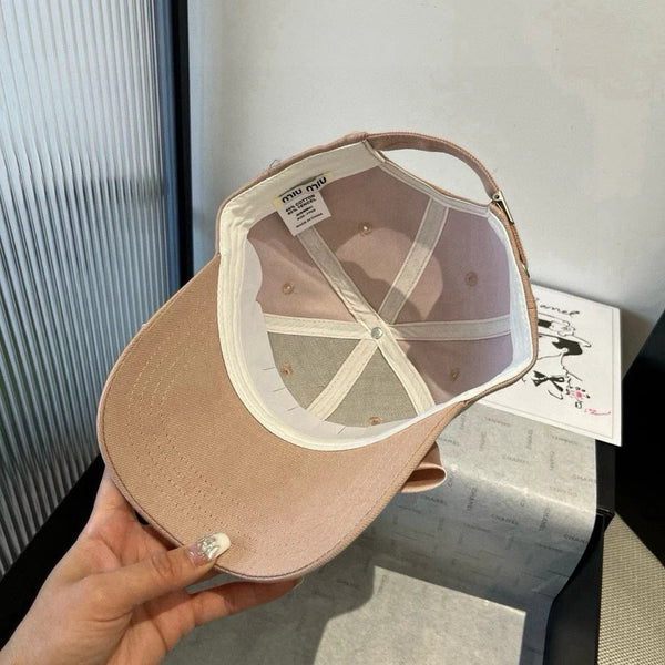 MM BASEBALL CAP IN BEIGE FABRIC WITH LARGE PINK BOW