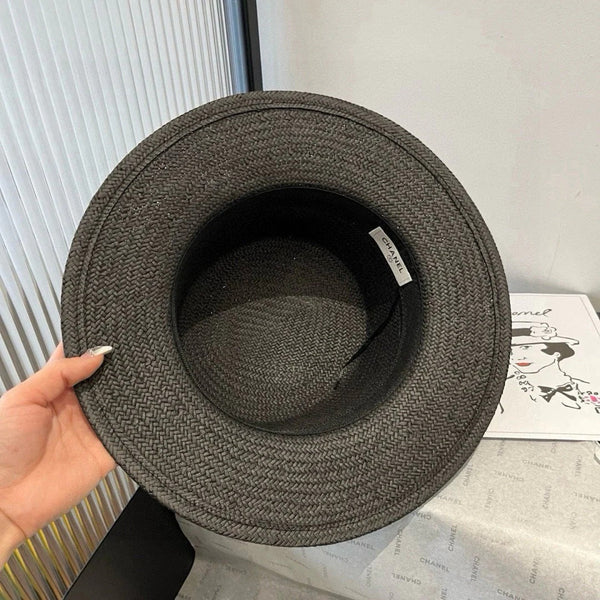 FLAT STRAW HAT BLACK FLOWER ATTACHMENT 673929