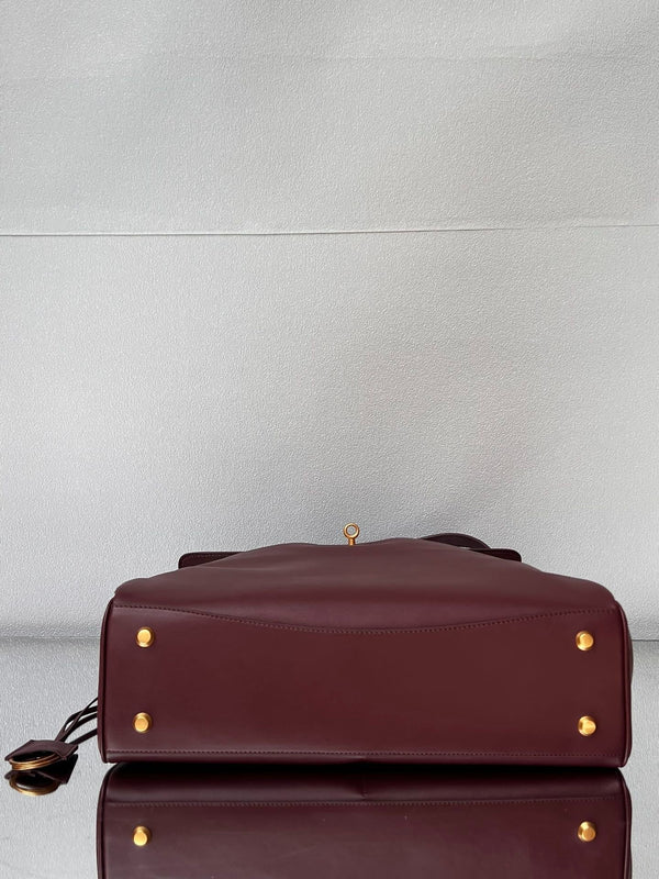 Grand sac Balenciaga 40 en cuir de veau bordeaux, finitions dorées