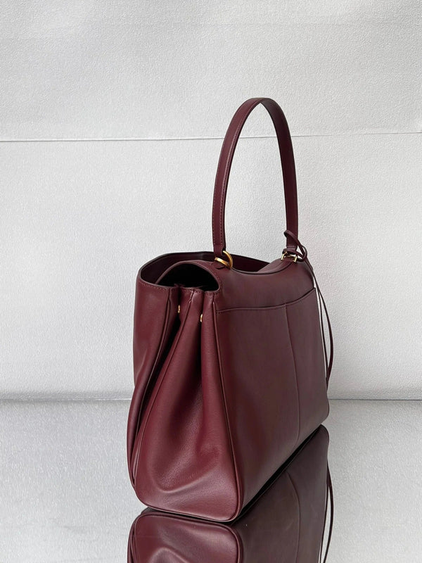 Grand sac Balenciaga 40 en cuir de veau bordeaux, finitions dorées