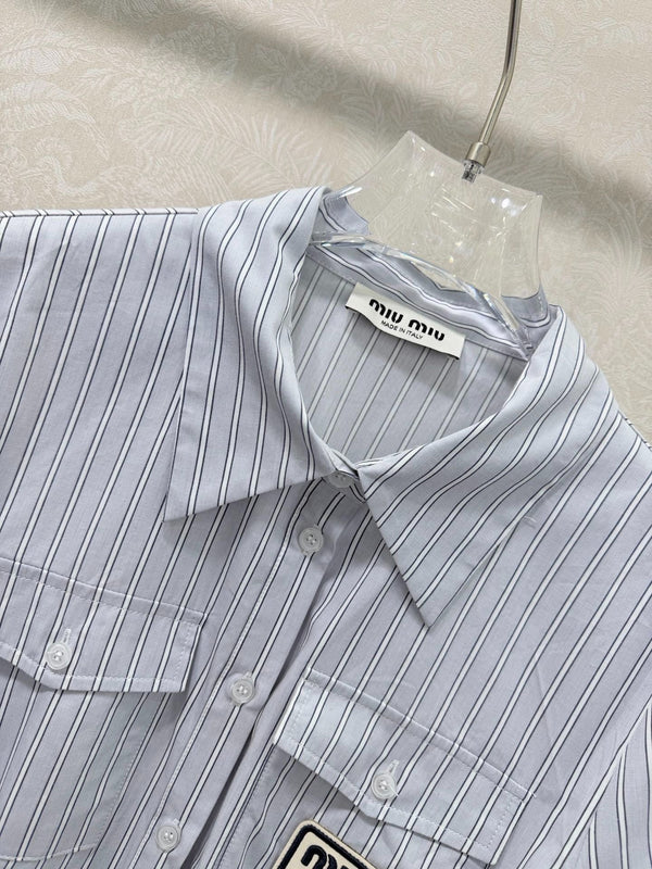 Robe courte à manches courtes et col à revers Miumiu 2026 en coton bleu 353015
