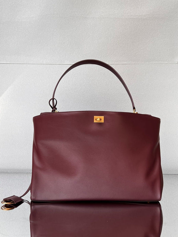 Grand sac Balenciaga 40 en cuir de veau bordeaux, finitions dorées