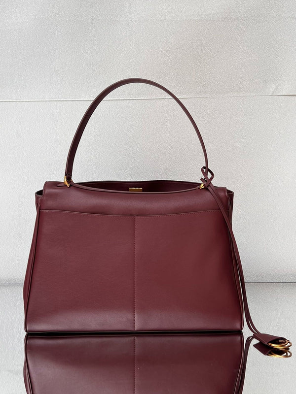 Grand sac Balenciaga 40 en cuir de veau bordeaux, finitions dorées
