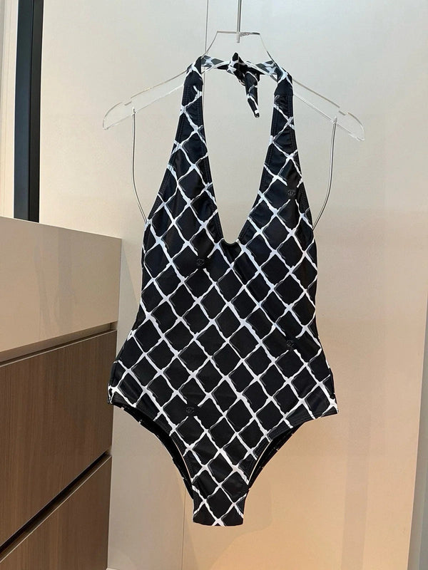 Completo bikini CC con stampa a quadri bianchi su sfondo nero 624545