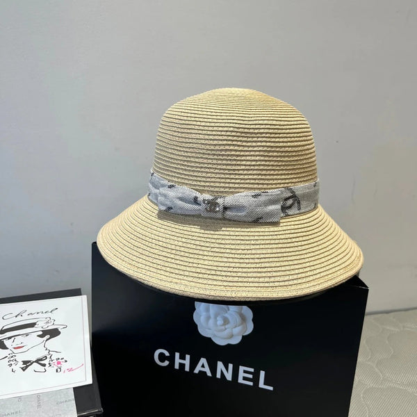 CAPPELLO A SECCHIELLO IN PAGLIA BEIGE CON FIOCCO 673979