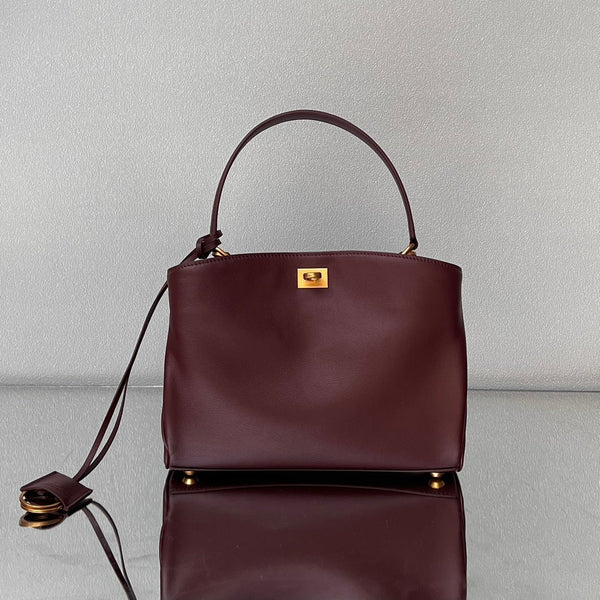 Sac Balenciaga petit modèle 29 en veau bordeaux avec finitions dorées