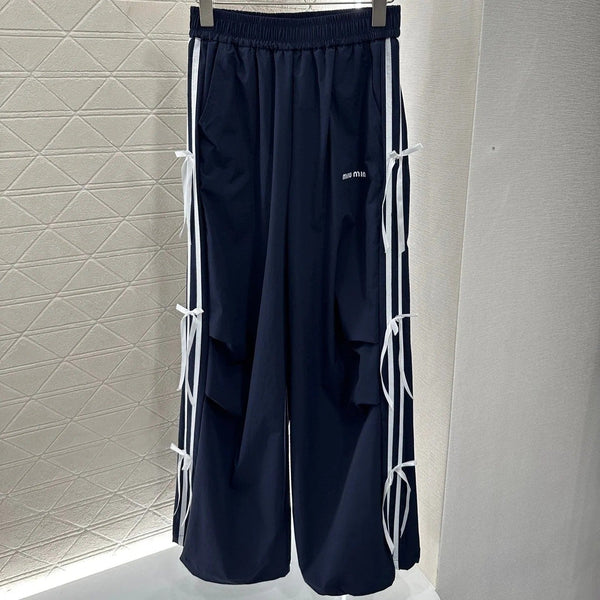 PANTALONI MIUMIU A VITA ALTA CON FIOCCO 276652