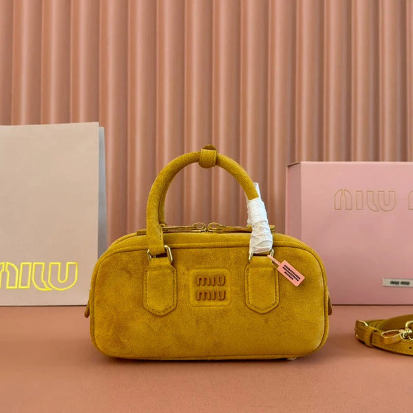 BORSA ARCADIE 22 IN CAMOSCIO GIALLO SENAPE CON FERRAMENTA ORO