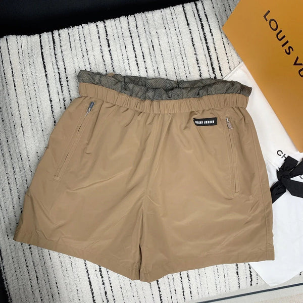 PANTALONCINI MIUMIU 25S 268037