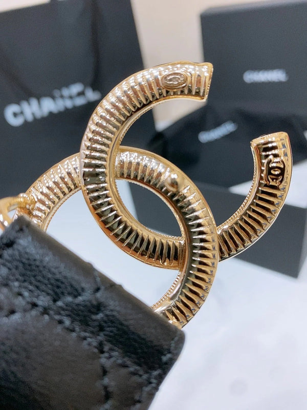 CINTURA DOUBLE C 38MM IN PELLE DI AGNELLO TRAPUNTATA NERA CON FIBBIA STAMPA LEOPARDATA NERA E BEIGE