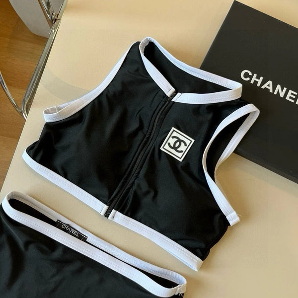 Completo costume da bagno bikini CC con finiture nere e bianche 596500