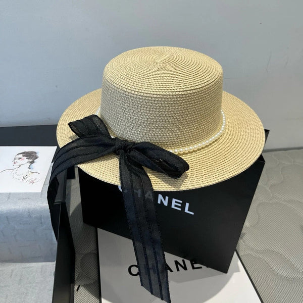 FLAT STRAW HAT WITH BOW BLACK 673921