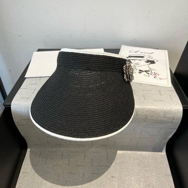 CC CAPPELLO DA SOLE MODEM NERO CON FIORE 673934